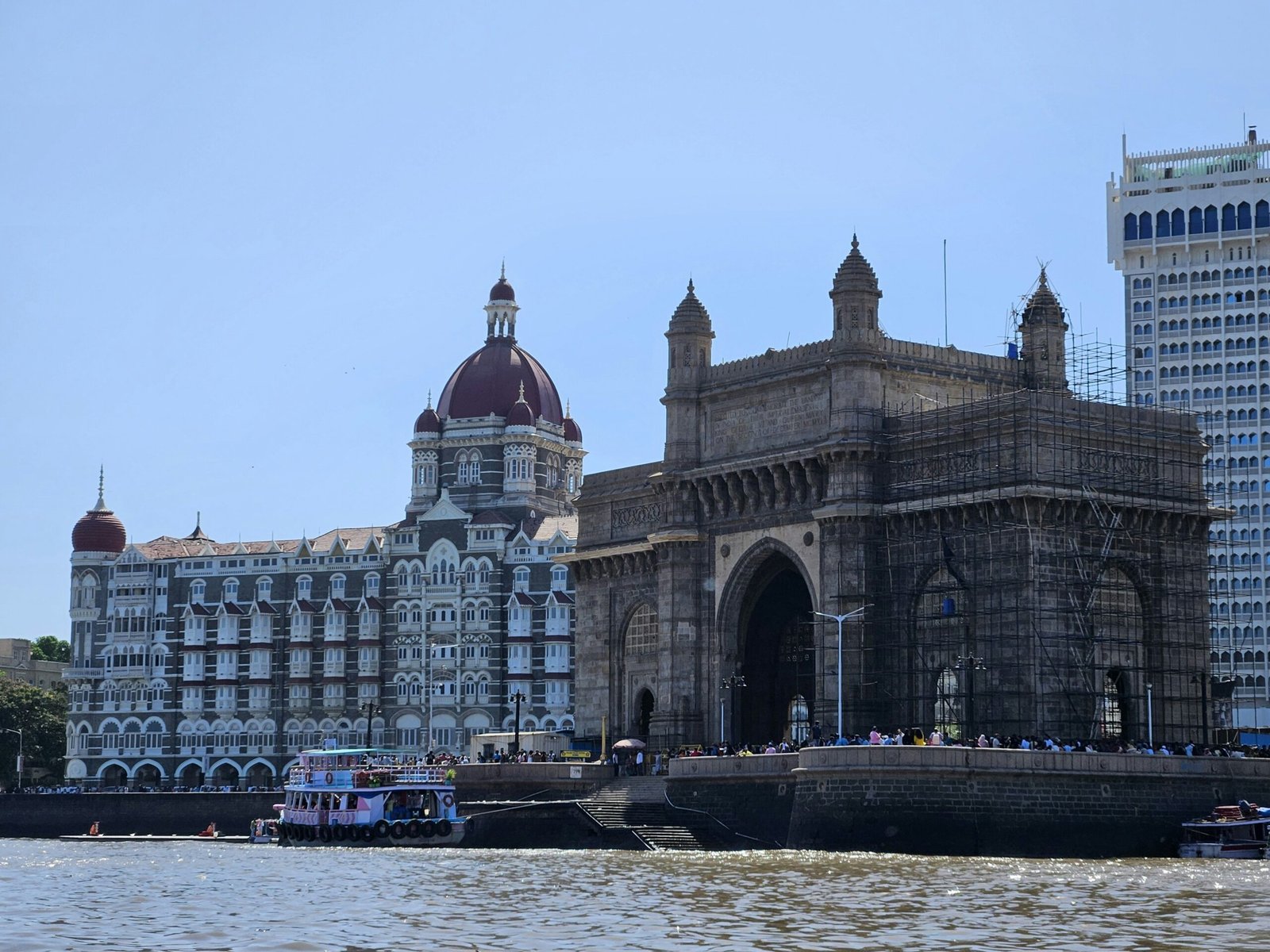 The Taj Mahal Palace Hotel and Gateway of India on the Mumbai waterfront, historic landmarks central to the city’s colonial and modern identity.